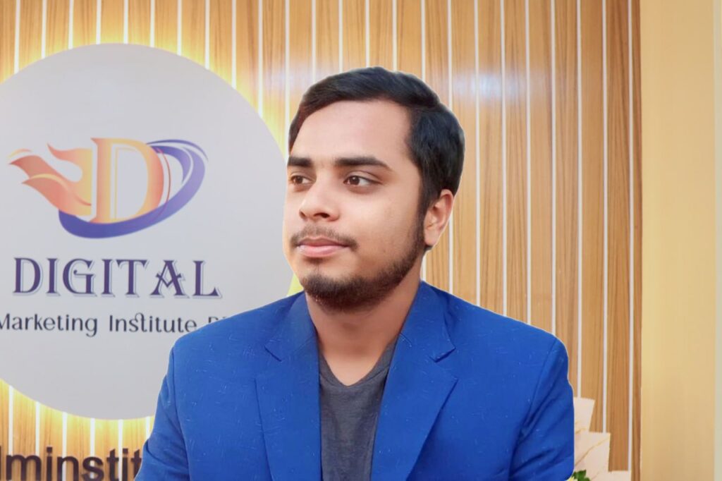 Photo of MD Robiul, Web Developer of Digital Marketing Institute BD, standing in a modern office with the company logo in the background.